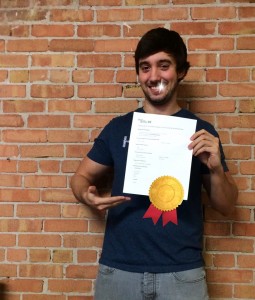 Ben holding certificate